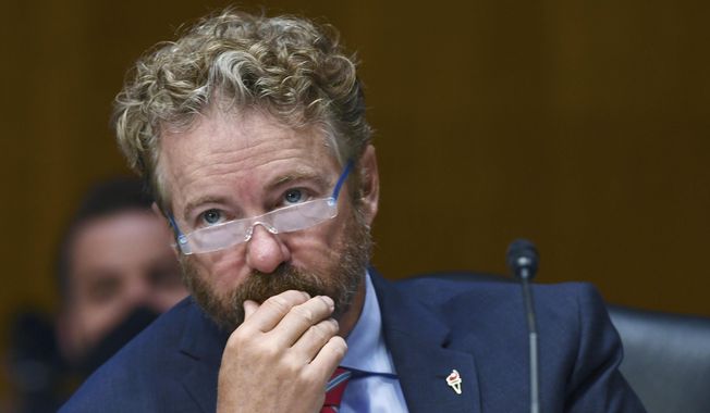 Sen. Rand Paul, R-Ky., listens to testimony before the Senate Committee for Health, Education, Labor, and Pensions hearing, Tuesday, May 12, 2020, on Capitol Hill in Washington. (Toni L. Sandys/The Washington Post via AP, Pool) ** FILE **