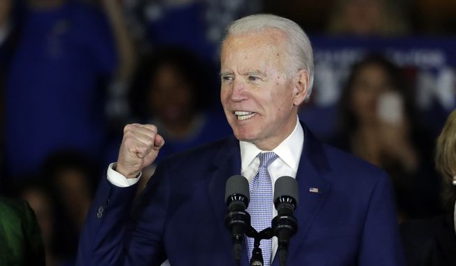 In this March 3, 2020, file photo, Democratic presidential candidate former Vice President Joe Biden speaks at a primary election night campaign rally in Los Angeles.  (AP Photo/Chris Carlson, File)  **fiLE**