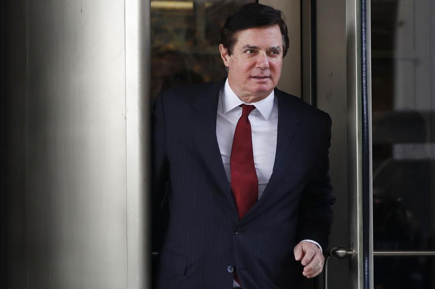FILE- In this Nov. 6, 2017 file photo, Paul Manafort, President Donald Trump's former campaign chairman, leaves the federal courthouse in Washington. Manafort has been released from federal prison to serve the rest of his sentence in home confinement over concerns about the coronavirus, his lawyer said Wednesday. (AP Photo/Jacquelyn Martin)