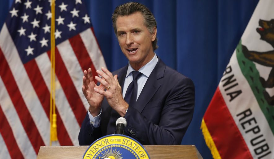 California Gov. Gavin Newsom discusses his revised 2020-2021 state budget during a news conference in Sacramento, Calif., Thursday, May 14, 2020. California Democratic Gov. Gavin Newsom presented a revised $203 billion budget proposal to state lawmakers Thursday, reflecting an economy and tax revenues hobbled by the coronavirus pandemic. (AP Photo/Rich Pedroncelli, Pool)