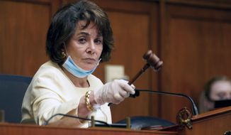 Chairman Rep. Anna Eshoo, D-Calif., gavels during a House Energy and Commerce Subcommittee on Health hearing to discuss protecting scientific integrity in response to the coronavirus outbreak, Thursday, May 14, 2020, on Capitol Hill in Washington. (Greg Nash/Pool via AP)