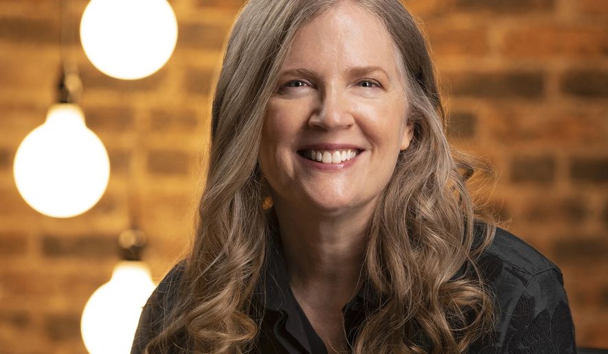 This image released by Scholastic shows Suzanne Collins, author of the Hunger Games novels. (Todd Plitt/Scholastic via AP)