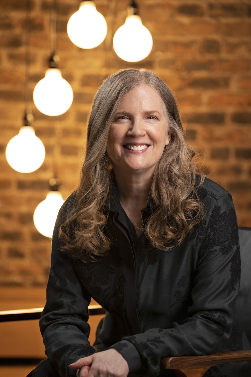 This image released by Scholastic shows Suzanne Collins, author of the Hunger Games novels. (Todd Plitt/Scholastic via AP)