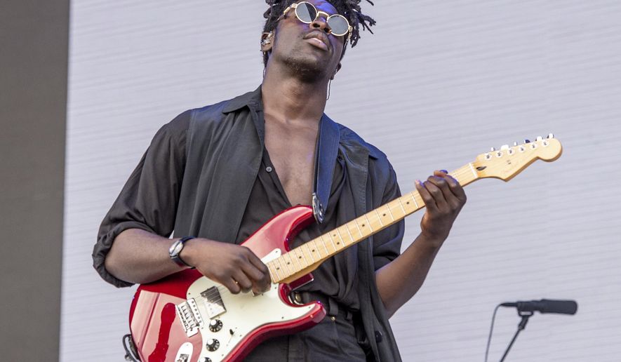FILE - This June 9, 2018 file photo shows Moses Sumney performing at the Bonnaroo Music and Arts Festival in Manchester, Tenn. Sumney's latest album is "Grae," released May 15. (Photo by Amy Harris/Invision/AP, File)