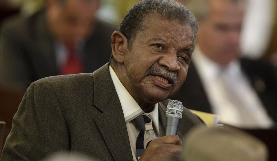FILE - In this July 2, 2012, file photo, Rep. Larry Womble, D- Forsyth, asks his fellow legislators to not override Gov. Beverly Perdue's veto of the bill rewriting the 2009 Racial Justice Act during a legislative session in the House of Representatives in Raleigh, N.C., Womble, a North Carolina state legislator who championed the cause of compensating North Carolina’s sterilization victims from the 20th century has died of natural causes, on Thursday, May 14,2020. He was 78. (Shawn Rocco/The News & Observer via AP)