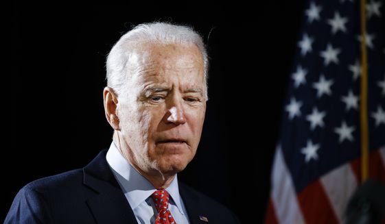In this March 12, 2020, file photo Democratic presidential candidate former Vice President Joe Biden arrives to speak about the coronavirus in Wilmington, Del. Biden says he would like to be a transition from President Donald Trump to younger, rising Democratic stars. (AP Photo/Matt Rourke, File)