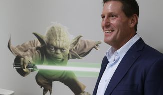 In this July 13, 2015 file photo, Disney chief strategy officer Kevin Mayer visits the company&#39;s &amp;quot;accelerator&amp;quot; space in Glendale, Calif.  Mayer will also be chief operating officer of TikTok&#39;s Chinese parent company, ByteDance, and report to its founder and CEO, Yiming Zhang, the company announced Monday, May 18, 2020. TikTok&#39;s app features short videos, many with music and dancing, that has become a favorite of younger people and is known for its goofy, light-hearted feel. (AP Photo/Damian Dovarganes, file)