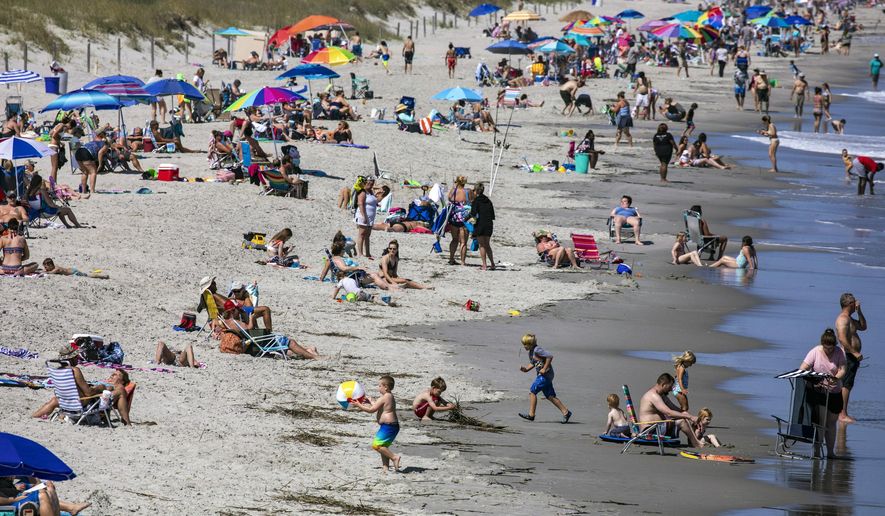The view to the north from Myrtle Beach State Park Pier on Saturday, May 16, 2020 in Myrtle Beach, S.C. With hotels, beaches, shopping and restaurants reopening along the Grand Strand, tourist season kicked off this weekend despite coronavirus concerns.(Jason Lee/The Sun News via AP)