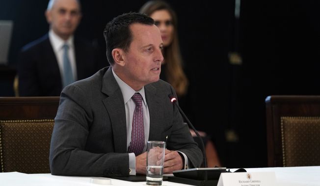 Acting director of national intelligence Richard Grenell speaks during a Cabinet Meeting with President Donald Trump in the East Room of the White House, Tuesday, May 19, 2020, in Washington. (AP Photo/Evan Vucci)