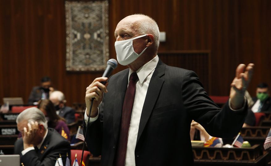 Arizona House Speaker Rusty Bowers, R-Mesa, speaks during a vote in the Arizona House of Representatives to end the 2020 session due to the coronavirus Tuesday, May 19, 2020, in Phoenix. Arizona House voted Tuesday not to join the Senate in ending the the 2020 legislative session, going ahead with legislation that had been in the pipeline before lawmakers paused the session in March amid concerns about the coronavirus. (AP Photo/Ross D. Franklin)