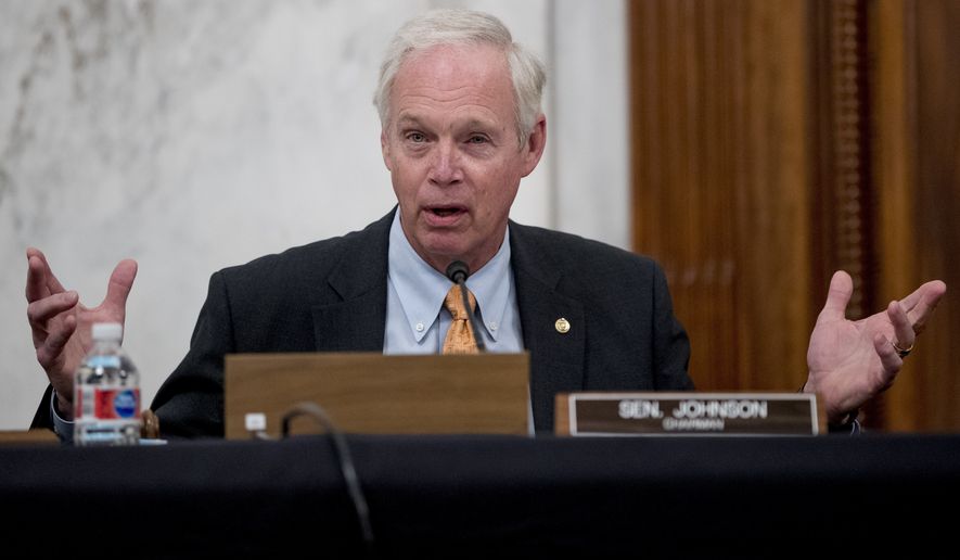 Chairman Sen. Ron Johnson, R-Wis., speaks as the Senate Homeland Security and Governmental Affairs Committee meets on Capitol Hill in Washington, Wednesday, May 20, 2020, to issue a subpoena Blue Star Strategies. (AP Photo/Andrew Harnik) ** FILE **