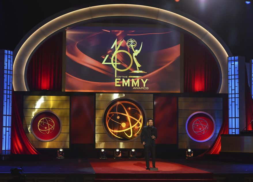 FILE - This May 5, 2019 file photo shows host Mario Lopez on stage at the 46th annual Daytime Emmy Awards in Pasadena, Calif. The Daytime Emmy Awards are skipping a theater ceremony because of the coronavirus but the honors will be presented on a TV broadcast on June 26. Nominations for the 47th annual Daytime Emmys will be announced Thursday on CBS’ “The Talk,” with categories including best drama series, talk show and game show. The TV academy that organizes the daytime awards had announced it wouldn’t hold the traditional theater ceremony out of pandemic safety concerns. (Photo by Chris Pizzello/Invision/AP, File)
