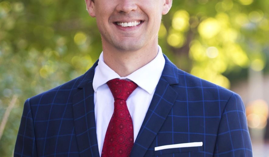 This undated photo provided by the Nicholas For Congress campaign shows Republican candidate Nicholas Jones, who is seeking to represent Idaho in Congress. Jones filed a lawsuit on Tuesday, May 19, 2020, claiming that election officials botched the mail-in primary process. (Kristen McPeek/Nicholas For Congress via AP)