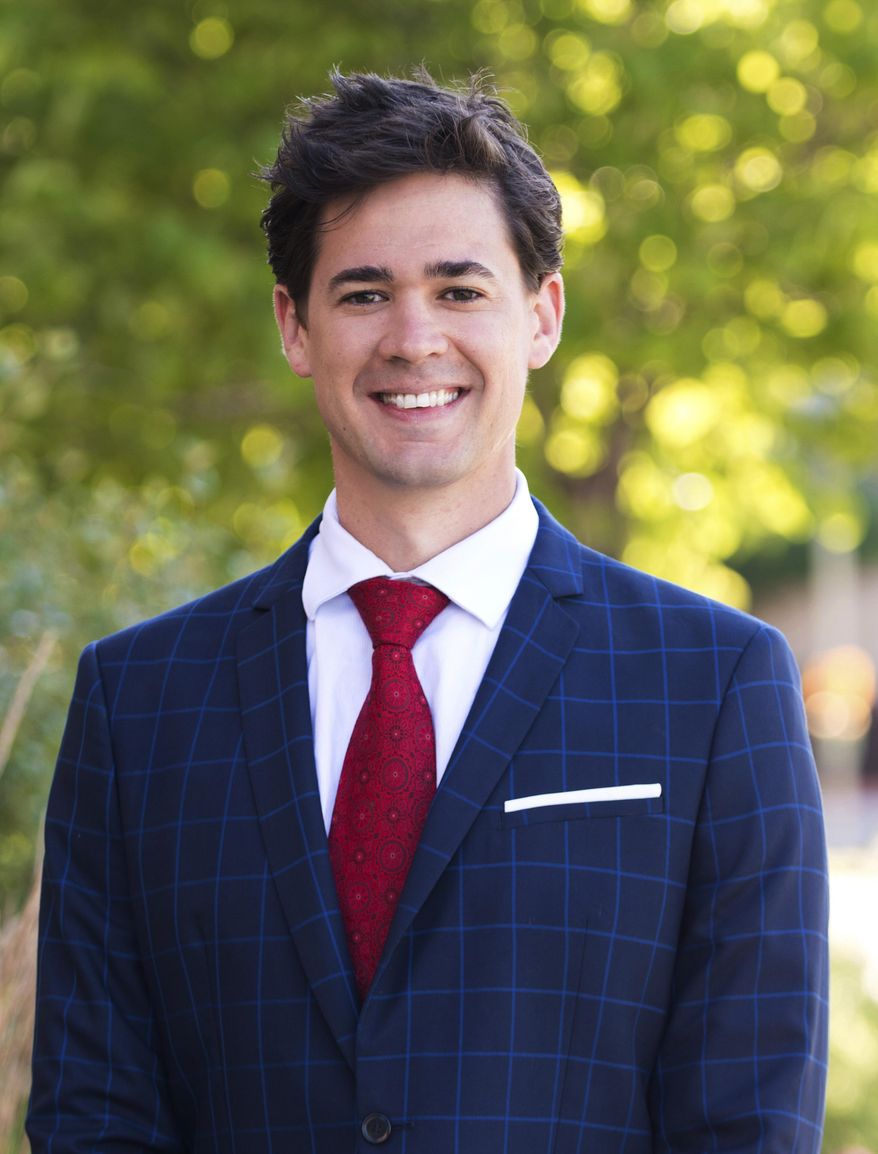 This undated photo provided by the Nicholas For Congress campaign shows Republican candidate Nicholas Jones, who is seeking to represent Idaho in Congress. Jones filed a lawsuit on Tuesday, May 19, 2020, claiming that election officials botched the mail-in primary process. (Kristen McPeek/Nicholas For Congress via AP)