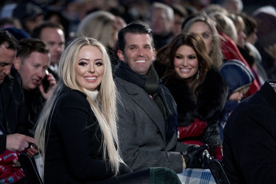 FILE - In this Nov. 28, 2018, file photo from left, Tiffany Trump, the daughter of President Donald Trump, Donald Trump Jr. and Kimberly Guilfoyle, arrive ahead of President Donald Trump and first lady Melania Trump at the National Christmas Tree lighting ceremony at the Ellipse near the White House in Washington. Tiffany, recently graduated from Georgetown Law School. “Just what I need is a lawyer in the family. Proud of you Tiff!” President Donald Trump said Wednesday, May 20, 2020, in a congratulatory tweet. (AP Photo/Andrew Harnik, File)