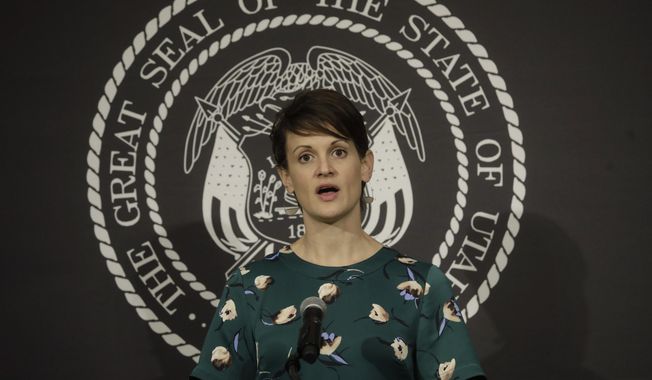 Dr. Angela Dunn, state epidemiologist from the Utah Department of Health, speaks during the daily COVID-19 briefing at the Utah State Capitol Thursday, April 9, 2020, in Salt Lake City. (AP Photo/Rick Bowmer, Pool)