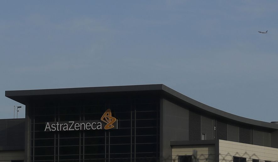 In this Thursday, Feb. 20, 2020, file photo, a view of the AstraZeneca logo, on a building, in South San Francisco, Calif. Drugmaker AstraZeneca secured its first agreements Thursday, May 21, 2020, for 400 million doses of a COVID-19 vaccine, bolstered by an investment from the U.S. vaccine agency. (AP Photo/Jeff Chiu, File)