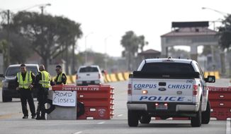 The entrances to the Naval Air Station-Corpus Christi are closed following an active shooter threat, Thursday, May 21, 2020, in Corpus Christi, Texas. Naval Air Station-Corpus Christi says the shooter was &amp;quot;neutralized&amp;quot; and the facility is on lockdown.  (Annie Rice/Corpus Christi Caller-Times via AP)