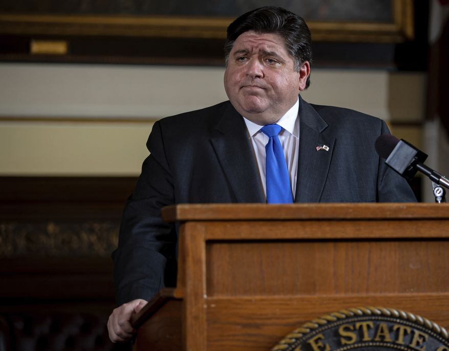 Illinois Gov. J.B. Pritzker answers questions from the media during his daily press briefing on the COVID-19 pandemic from his office at the Illinois State Capitol, Friday, May 22, 2020, in Springfield, Ill. (Justin L. Fowler/The State Journal-Register via AP, Pool)