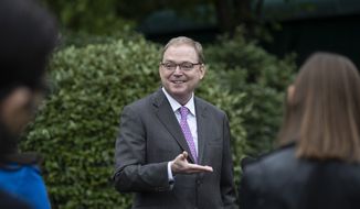 White House senior adviser Kevin Hassett speaks with reporters at the White House, Friday, May 22, 2020, in Washington. (AP Photo/Alex Brandon)