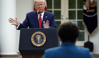FILE - This March 29, 2020 file photo shows President Donald Trump answering a question from PBS reporter Yamiche Alcindor during a coronavirus task force briefing in the Rose Garden of the White House in Washington. Reporters Alcindor, Weijia Jiang and Kaitlan Collins have faced hostility from Trump at news conferences with stoicism. Their experiences illustrate the challenge of working at a White House with near-daily accessibility to a president who considers the press an enemy. (AP Photo/Patrick Semansky, FIle)