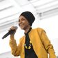 In this Feb. 29, 2020, file photo, U.S. Rep. Ilhan Omar, D-Minn., speaks at a rally in Springfield, Mass. At a young age, Rep. Omar earned a reputation as a fighter -- a bit of a misfit who saw fighting as a way to survive and earn respect. In her new memoir being released Tuesday, May, 26, 2020. Omar provides details about her life, as she went from a refugee and immigrant to congresswoman for Minnesota. (AP Photo/Susan Walsh File)