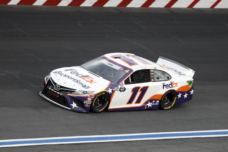 Denny Hamlin drives during the NASCAR Cup Series auto race at Charlotte Motor Speedway Sunday, May 24, 2020, in Concord, N.C. (AP Photo/Gerry Broome) **FILE**