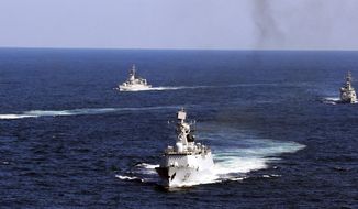 In this Oct. 19, 2012, photo, Chinese navy vessels take part in a drill in the waters off Zhoushan in east China&#39;s Zhejiang province. (AP Photo) **FILE**