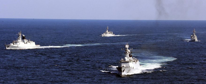 In this Oct. 19, 2012, photo, Chinese navy vessels take part in a drill in the waters off Zhoushan in east China&#39;s Zhejiang province. (AP Photo) **FILE**