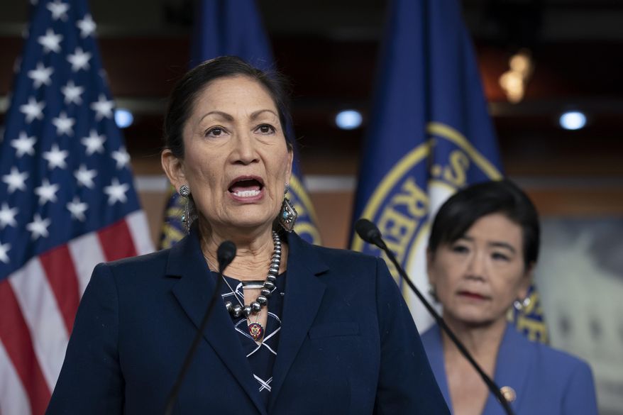 Rep. Deb Haaland, D-N.M., Native American Caucus co-chair, joined at right by Rep. Judy Chu, D-Calif., chair of the Congressional Asian Pacific American Caucus, speaks to reporters about the 2020 Census on Capitol Hill in Washington, Thursday, March 5, 2020. (AP Photo/J. Scott Applewhite)