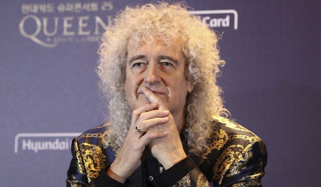 In this Jan. 16, 2020, file photo, Brian May, of Queen, attends a press conference ahead of the Rhapsody Tour at a hotel in Seoul. May said he recently had three stents put in after experiencing “a small heart attack.” The guitarist said Monday, May 25, in an Instagram video that the stents were put in after his doctor drove him to a hospital after he starting experiencing symptoms. (Chung Sung-Jun/Pool Photo via AP)