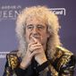 In this Jan. 16, 2020, file photo, Brian May, of Queen, attends a press conference ahead of the Rhapsody Tour at a hotel in Seoul. May said he recently had three stents put in after experiencing “a small heart attack.” The guitarist said Monday, May 25, in an Instagram video that the stents were put in after his doctor drove him to a hospital after he starting experiencing symptoms. (Chung Sung-Jun/Pool Photo via AP)