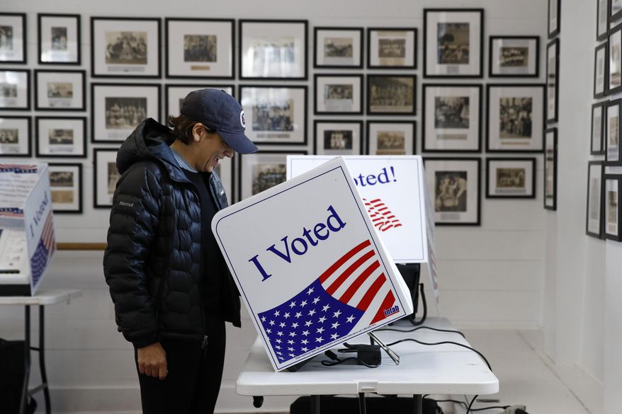 A voter fills out her ballot at a primary polling place, Saturday, Feb. 29, 2020, in Charleston, S.C. (AP Photo/Patrick Semansky)