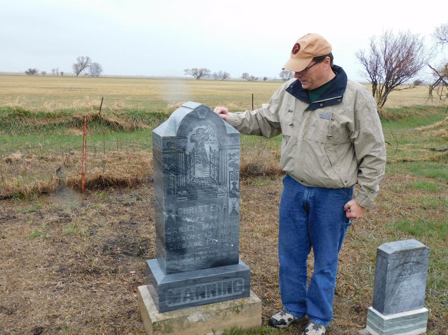 Mark Jorgensen, Antler Cemetery Association, has been very active in the restoration of the historic Pioneer Cemetery situated on the north bank of Antler Creek, a short distance from the Canadian border. (Kim Fundingsland/Minot Daily News via AP)