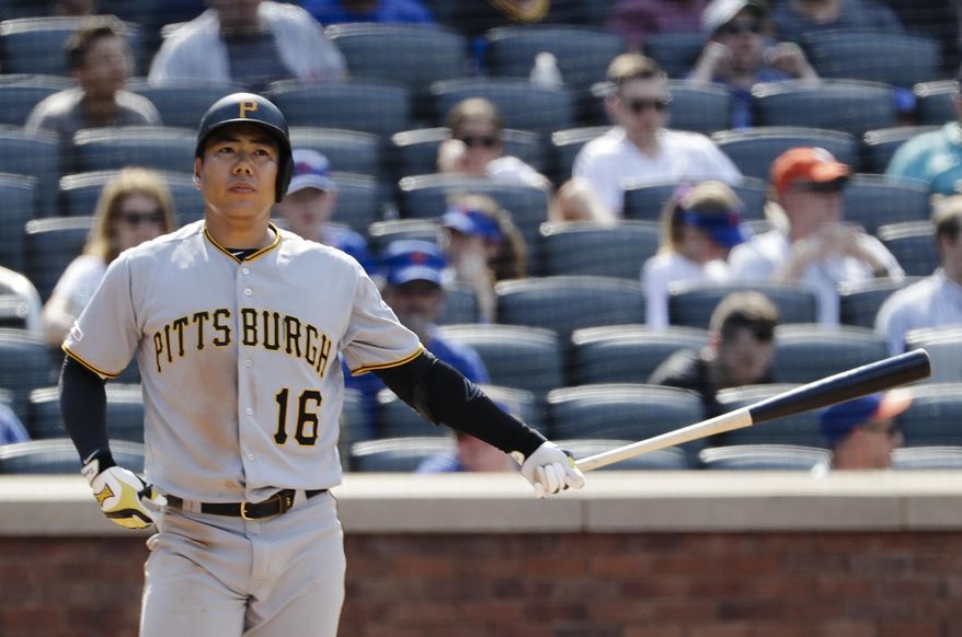FILE - In this July 28, 2019, file photo, then Pittsburgh Pirates' Jung Ho Kang, of South Korea, reacts after striking out during the eighth inning of a baseball game against the New York Mets, in New York. The Korean Baseball Organization has suspended ex-Pittsburgh Pirates infielder Jung Ho Kang for a year and ordered him to perform 300 hours of community service over a series drunk driving cases.(AP Photo/Frank Franklin II, File)
