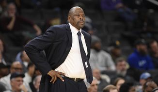 In this Wednesday, Feb. 5, 2020, file photo, Georgetown head coach Patrick Ewing looks on during the first half of an NCAA college basketball game against Seton Hall, in Washington. In a statement issued by Georgetown on Friday, May 22, 2020. (AP Photo/Nick Wass, File) **FILE**
