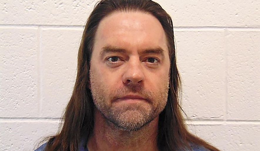 In this Oct. 14, 2018 photo provided by the Michigan Department of Corrections is Temujin Kensu, also known as Fred Freeman. Michigan Gov. Gretchen Whitmer is being asked to release Kensu who has been fighting his murder conviction for more than 30 years and now is stricken with COVID-19. The University of Michigan law school’s Innocence Clinic has long argued that he was wrongly convicted of killing a man outside a Port Huron college in 1986. (Michigan Department of Corrections via AP)