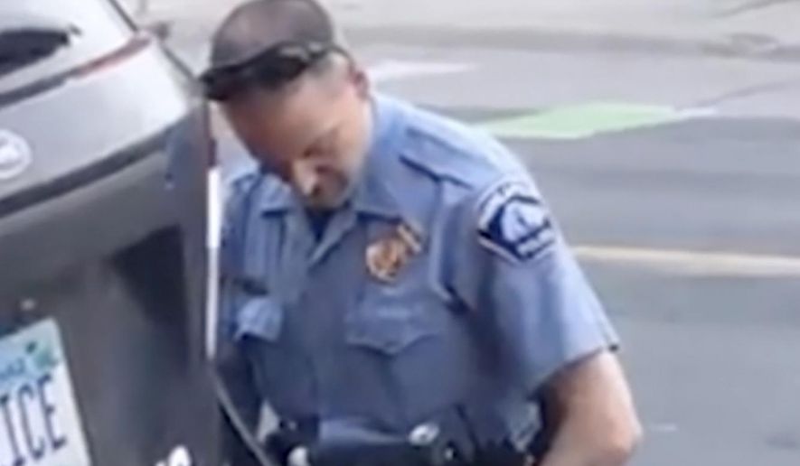 In this Monday, May 25, 2020 frame from video provided by Darnella Frazier, Minneapolis police officer Dereck Chauvin kneels on the neck of George Floyd, a handcuffed man who was pleading that he could not breathe. (Darnella Frazier via AP)  **FILE**