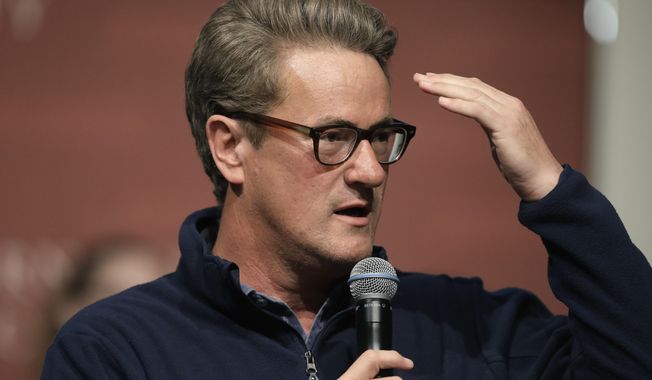 In this Oct. 11, 2017, file photo, MSNBC television anchor Joe Scarborough takes questions from an audience at forum at the John F. Kennedy School of Government, on the campus of Harvard University, in Cambridge, Mass.   (AP Photo/Steven Senne, File)