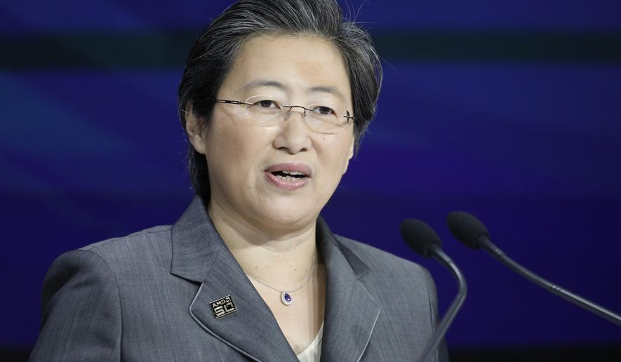 FILE - In this May 1, 2019 photo, Lisa Su, president and CEO of AMD, attends the opening bell at Nasdaq, in New York. The typical pay package for CEOs at the biggest U.S. companies topped $12.3 million in 2019, and the gap between the boss and their workforces widened further, according to AP’s annual survey of executive compensation.    (AP Photo/Mark Lennihan, File)