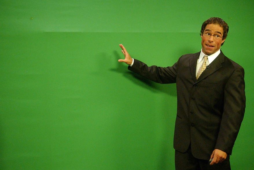 FILE - In this Oct. 5, 2006, file photo, KRQE-TV chief meteorologist Mark Ronchetti stands in front of a "green screen" as he gives the forecast at the KRQE studios in Albuquerque, N.M. Ronchetti, a former weatherman, is competing for the Republican U.S. Senate nomination to take on Democratic Rep. Ben Ray Lujan. (Jaelyn deMaria/The Albuquerque Journal via AP, File)