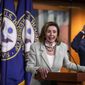 House Speaker Nancy Pelosi of Calif., with House Majority Whip James Clyburn of S.C., back right, speaks during a news conference on Capitol Hill, Wednesday, May 27, 2020, in Washington. (AP Photo/Manuel Balce Ceneta)