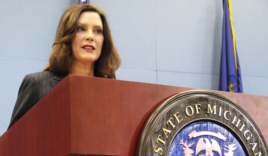 In this Feb. 4, 2020, file photo, Michigan Gov. Gretchen Whitmer speaks with reporters at her office in Lansing, Mich. (AP Photo/David Eggert, File)