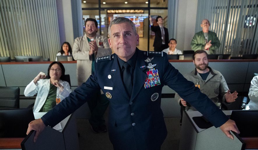 This image released by Netflix shows Steve Carell, center, from the comedy series &quot;Space Force&quot; available for streaming on Netflix on May 29, 2020. Mr. Carell is among other celebrities who are under fire for donating money to a bail fund to spring accused rioters from jail in Minneapolis.  (Aaron Epstein/Netflix via AP)