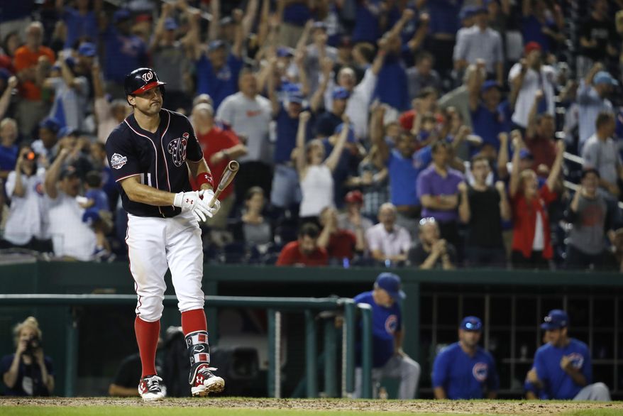 FILE - In this Sept. 13, 2018, file photo, as Chicago Cubs fans celebrate behind him, Washington Nationals' Ryan Zimmerman (11) reacts after striking out in the tenth inning of a baseball game at Nationals Park in Washington. With baseball on hold during the coronavirus pandemic, Zimmerman is offering his thoughts -- as told to AP Sports Writer Howard Fendrich -- in a diary of sorts. In the eighth installment, Zimmerman discusses what his biggest concerns would be about resuming competition in 2020, starting with assurances about testing for COVID-19. (AP Photo/Jacquelyn Martin, File)