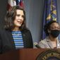 In this photo provided by the Michigan Executive Office of the Governor, Gov. Gretchen Whitmer speaks during a news conference Thursday, May 28, 2020, in Lansing, Mich. Whitmer urged the federal government to give the state more flexibility to spend coronavirus rescue aid to fill budget shortfalls and to pass another round of relief funding. (Michigan Executive Office of the Governor via AP)
