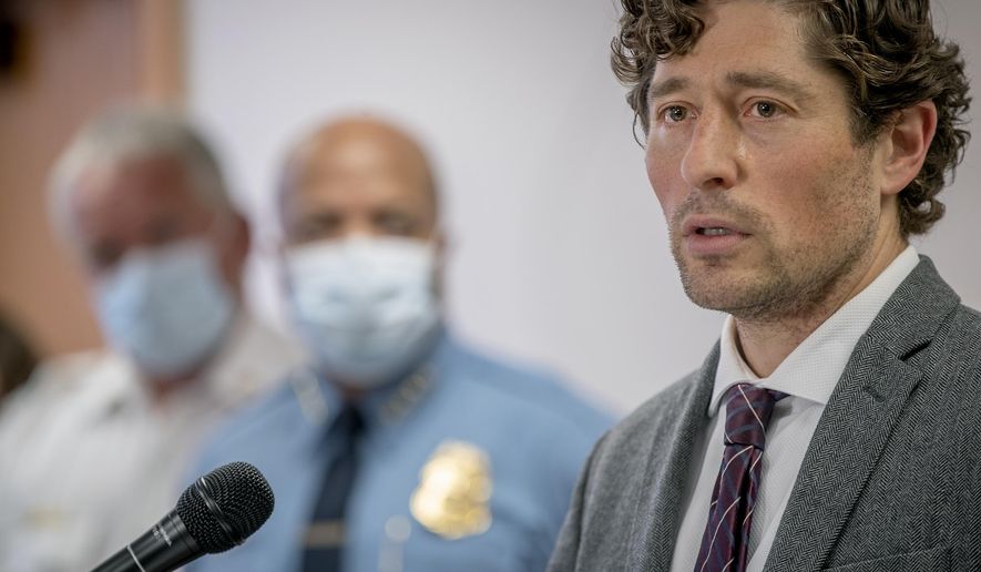 Minneapolis Mayor Jacob Frey speaks during a news conference Thursday, May 28, 2020 in Minneapolis, Minn. Violent protests over the death of a black man in police custody rocked a Minneapolis neighborhood for a second straight night as angry crowds looted stores, set fires and left a path of damage that stretched for miles. The mayor asked the governor to activate the National Guard. (Elizabeth Flores/Star Tribune via AP)