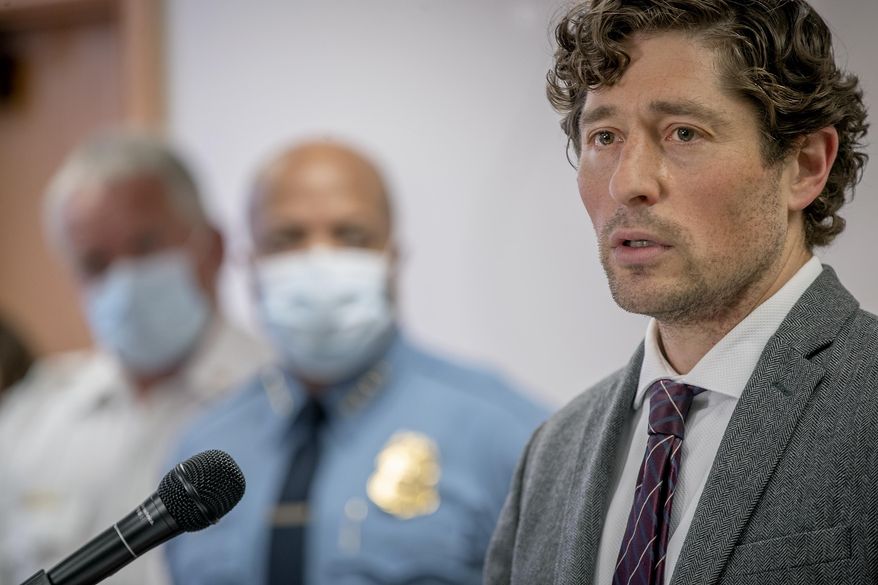 Minneapolis Mayor Jacob Frey speaks during a news conference Thursday, May 28, 2020 in Minneapolis, Minn. Violent protests over the death of a black man in police custody rocked a Minneapolis neighborhood for a second straight night as angry crowds looted stores, set fires and left a path of damage that stretched for miles. The mayor asked the governor to activate the National Guard. (Elizabeth Flores/Star Tribune via AP)