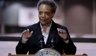 In this April 10, 2020 file photo Chicago Mayor Lori Lightfoot speaks during a news conference in Hall A at the COVID-19 alternate site at McCormick Place in Chicago.  (AP Photo/Nam Y. Huh, file) **FILE**
