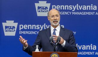 Pennsylvania Gov. Tom Wolf meets with the media at The Pennsylvania Emergency Management Agency (PEMA) headquarters, Friday, May 29, 2020, in Harrisburg, Pa. (Joe Hermitt/The Patriot-News via AP) ** FILE **